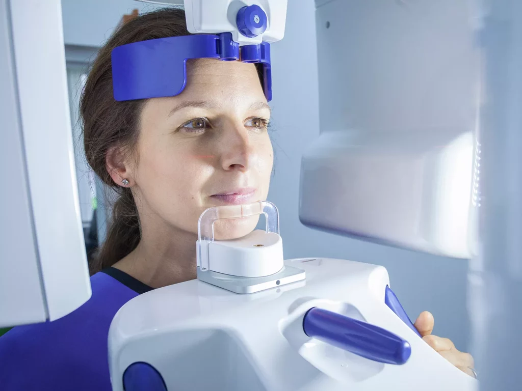 Woman having a cone beam scan.